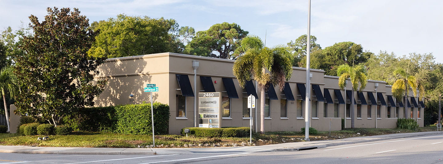 Everence Sarasota Fruitville office building with palm trees in front